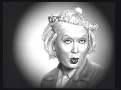 Волга-Волга. 2006. Кадры из кинофильма. Режиссеры: Павел Лабазов, Андрей Сильвестров. Идея проекта: Павел Лабазов, Андрей Сильвестров. В главной роли: Владислав Мамышев-Монро. Автор музыки: Эдуард Сивков. Courtesy XL галерея; Volga Volga. 2006. Film. Directed by Pavel Labazov and Andrei Silvestrov. Project idea by Pavel Labazov and Andrei Silvestrov. Starring Vladislav Mamyshev-Monroe. Music by Eduard Sivkov. Courtesy of the XL Gallery